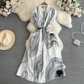 Bohemian seaside holiday beach dress gentle style short-sleeved V-neck waist medium-length A-line plaid dress