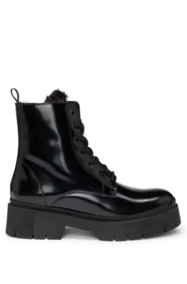 Faux-leather boots with logo zip-puller