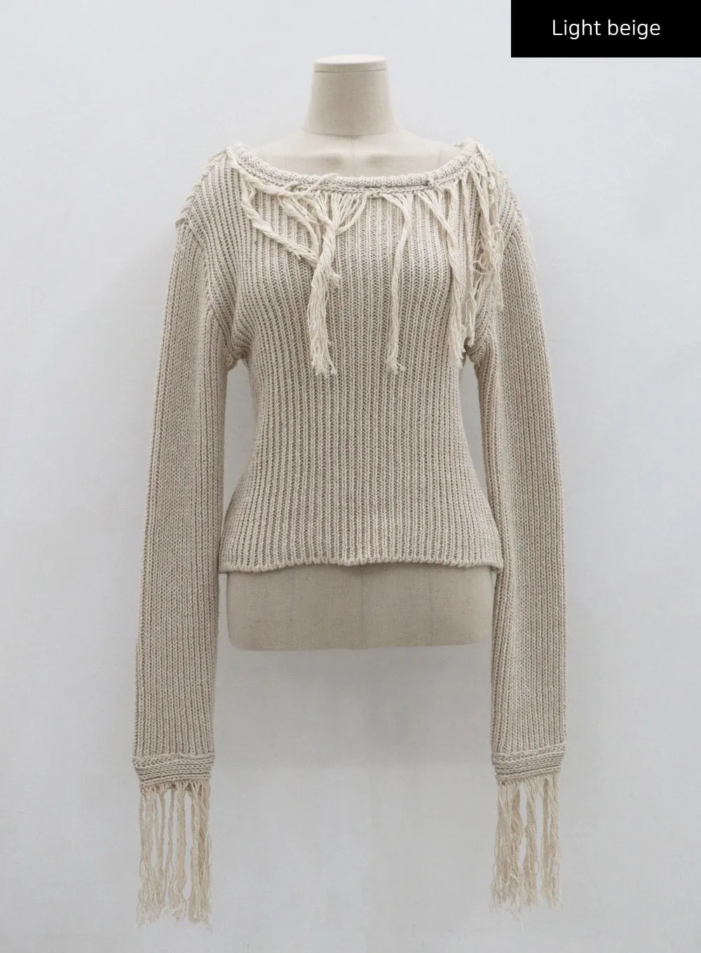 Long Sleeve Knit Top with Fringed Collin Design