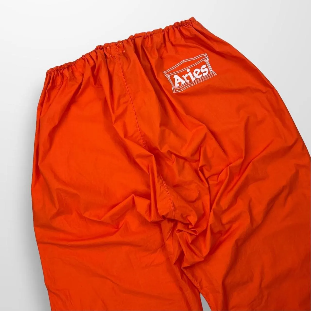 Stylish orange snow pants by Aries